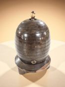 A treen string box in the form of a beehive, height 11.5 cm.