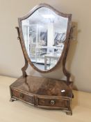 A Victorian style mahogany shield shaped mirror, width 45 cm.