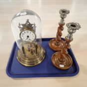 A pair of oak barley twist candlesticks with silvered metal sconces,