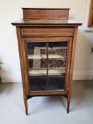 A Victorian mahogany and satinwood banded single door display cabinet, 55 cm x 36 cm x 110 cm.