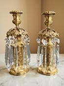A pair of gilt metal table candlestick lustres with crystal droplets and removable sconces,