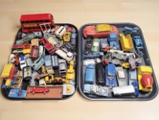 A collection of vintage play worn die cast vehicles including Corgi and Dinky.