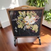 A needlework firescreen, height 69 cm.