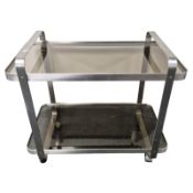 A metal and smoked glass two tier trolley, width 77 cm.