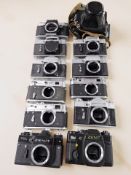 A collection of Russian / Soviet rangefinder camera bodies including Zenit, Zenith, Zorki and Kiev.