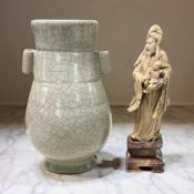 A Chinese celadon crackle-glaze twin-handled earthenware vase, height 25.