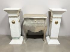 A contemporary silvered two drawer chest, width 55 cm, and a pair of classical style columns,