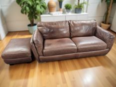 A stitched brown leather four seater settee, 224 cm x 103 cm x 88 cm,