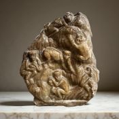 A Mughal carved jade boulder (probably 18th century) depicting monkeys amongst foliage,