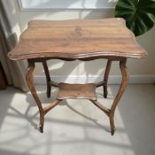 An Edwardian walnut occasional table, width 68 cm.