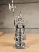 A metal fire companion set in the form of a knight in armour, height 73 cm.