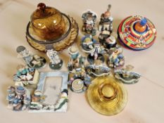 A group of resin ornaments, amber glass bowls, Chad Valley enamelled metal spinning top,