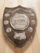 An oak and EPNS swimming competition plaque marked 'Alder School', height 38 cm.