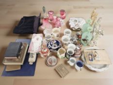 A group of oriental and other figures, Japanese export tea china, cranberry glass items,