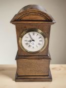 A German miniature oak longcase clock with movement and dial signed 'Mercedes', height 19 cm.