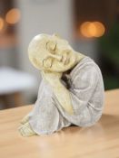 An oriental composition kneeling figure, height 28 cm,