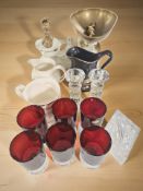 A set of enameled cast iron and brass scales with graduated weights,