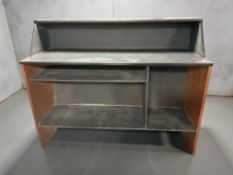 An ebonised and teak veneered counter, 137 cm x 50 cm x 110 cm.