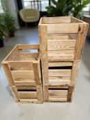 A set of five pine crates, each 47 cm wide.