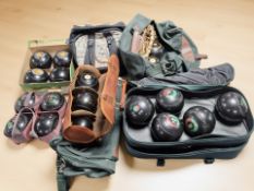 Several bags and cases of lawn bowls including Henselite and Taylor