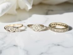 A diamond three stone illusion-set ring, marks rubbed, a further diamond ring stamped '9ct & Plat',