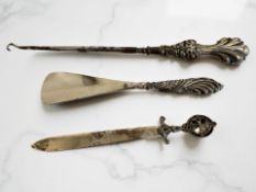 A silver letter knife with Maltese cross finial, length 17cm,