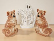 A 19th century Staffordshire figure on horseback and a further pair of dogs, height 32 cm.