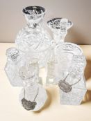 Crystal decanters, large bowl and cover, flower vases, pair of candlesticks,