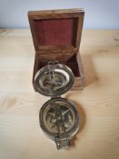 A reproduction natural sine compass including in brass mounted hardwood box.
