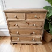 A modern pine five drawer chest, 103 cm x 47 cm x 107 cm.