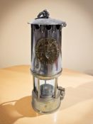 An Eccles Protector type SL miner's safety lamp