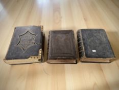 Three 19th century leather bound bibles.