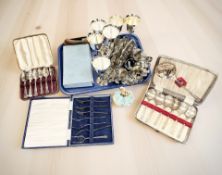 A quantity of silver plate including goblets, napkin rings, boxed cutlery, Japanese ceramic figure,