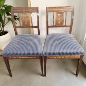 A pair of continental mahogany and satinwood marquetry occasional chairs.