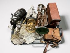 A pair of oak barley twist candlesticks, a carved ebony rhinoceros, brass model cannon,
