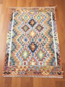 A Chobi Kilim rug, 148 cm x 104 cm.