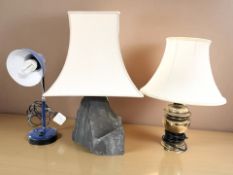 A slate table lamp, a brass lamp and a modern angle poised lamp, tallest 52 cm.