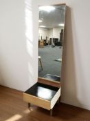 A 20th century teak cheval mirror, fitted a drawer beneath, width 45 cm.
