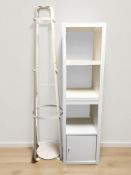 A contemporary metal hat and coat stand, and a cube shelf.