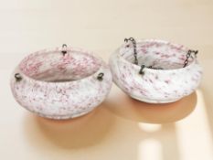 A pair of Art Deco marbled glass light shades, diameter 35 cm.
