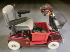 A Shoprider Sovereign mobility scooter, with manual,