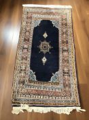 An Isfahan rug, Central Iran, 180 cm x 91 cm.