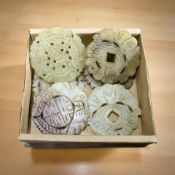 Six Chinese carved jade tokens,