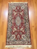 A machine-made rug of Iranian design,