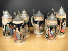 Five German pottery steins.