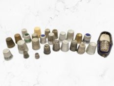 A group of thimbles including cased silver thimble Chester 1901,