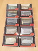 Ten Exclusive First Editions 1:76 scale die cast buses in boxes.