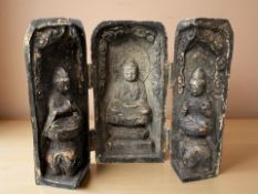A carved resin travelling Buddhist shrine,