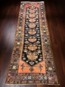 A Kurdish runner, North-West Iran, 316 cm x 97 cm.