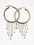 A pair of 9ct gold tasseled hoop earrings, diameter 2.5cm CONDITION REPORT: 3.
